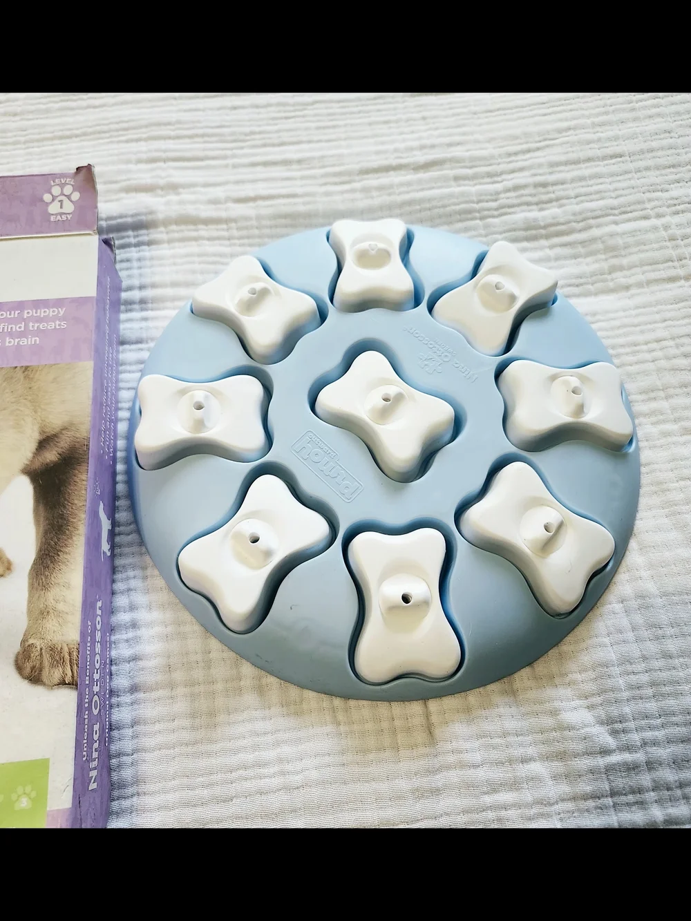 Nina Ottosson Level 1 Slow Feed Dog Puzzle Toy – Light Blue & Cream Treat
